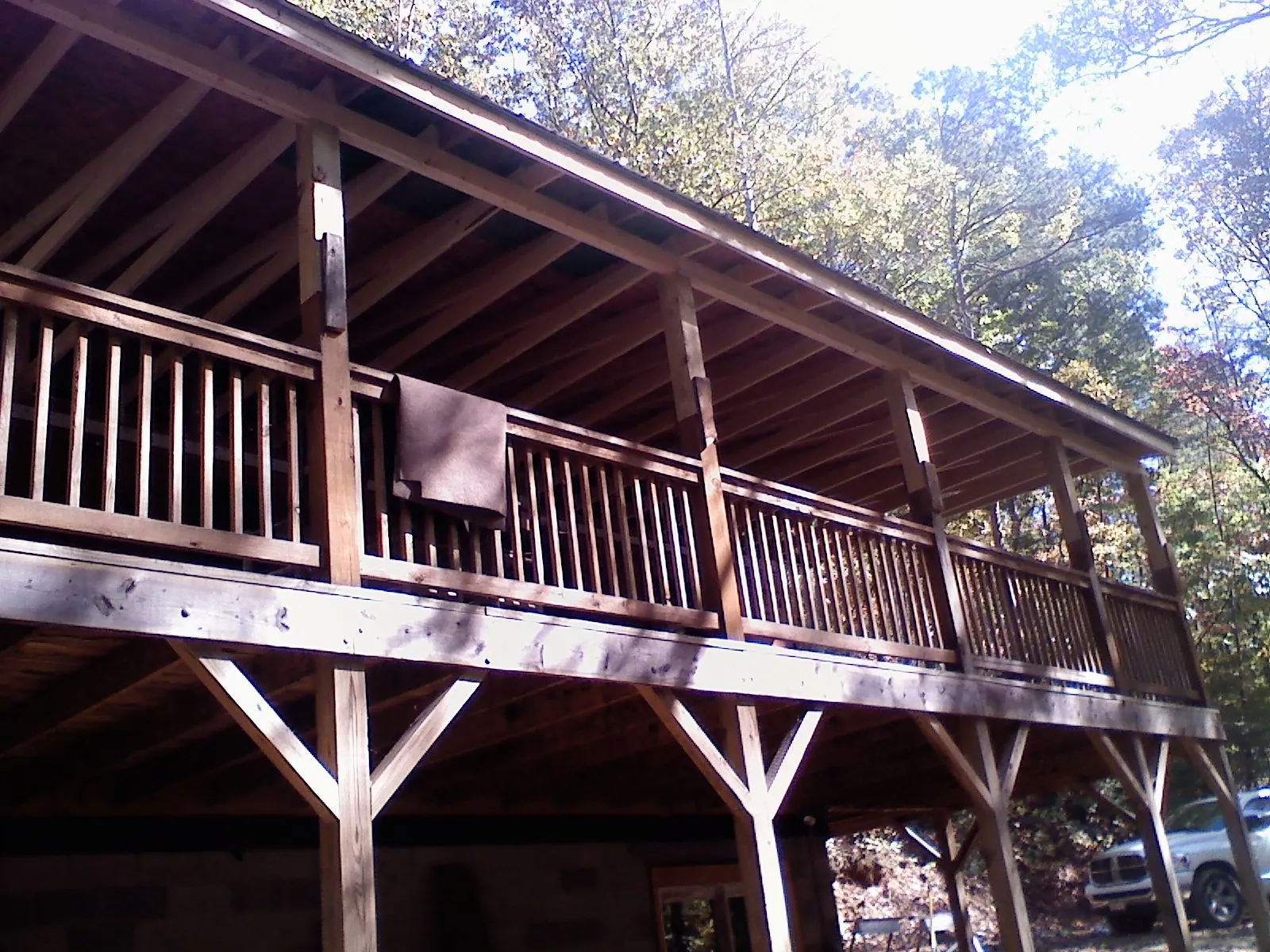 Timber framing under a new elevated porch and deck — Roof Leak Repair in Broken Arrow by Roofing Brothers